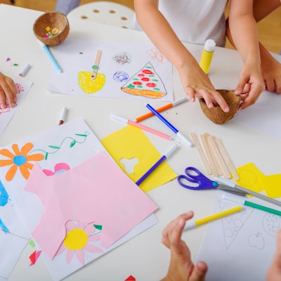 Children crafting at a table